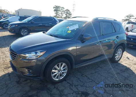 2016 Mazda Cx-5 Touring z USA, uszkodzony, nr VIN JM3KE2CYXG0745492